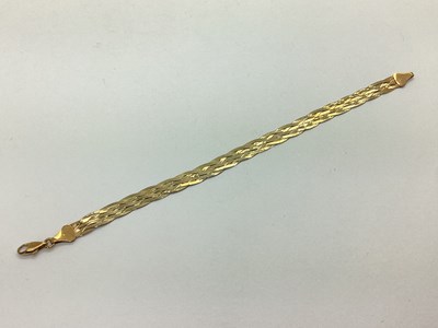Lot 141 - A Textured Woven Bracelet, stamped "375" and...