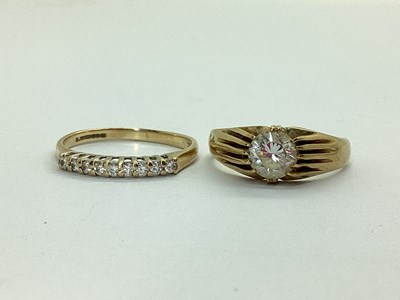 Lot 43 - A 9ct Gold Half Eternity Style Ring, claw set...