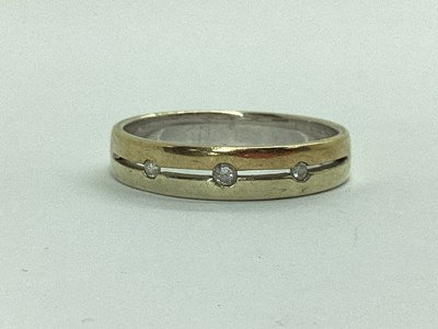Lot 37 - A Modern Bi-Coloured Inset Band, of openwork...