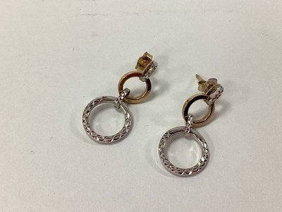 Lot 160 - A Pair of Bi-Colour Circular Drop Earrings, of...