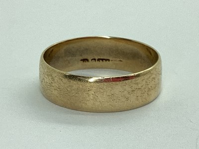 Lot 40 - A Plain Wedding Band, indistinctly stamped...