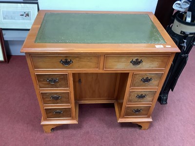 Lot 1522 - Yew Wood Kneehole Desk, top with a green...