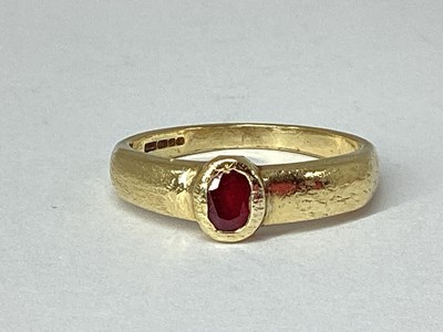 Lot 78 - A 9ct Gold Single Stone Set Ring, rubover set...