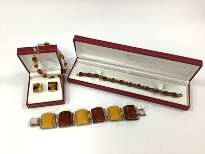 Lot 210 - A Chunky Amber Coloured Panel Bracelet, of...