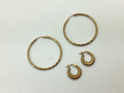 Lot 132 - A Pair of Hollow Hoop Earrings, of half...