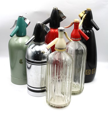 Lot 1361 - Six Vintage Soda Syphons, features two classic...