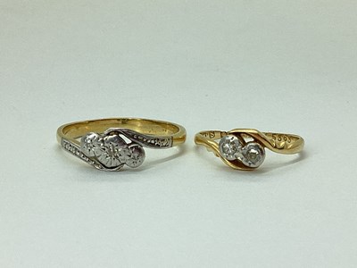 Lot 53 - A Dainty 18ct Gold Two Stone Twist Ring,...