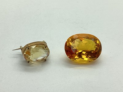 Lot 173 - An Antique Citrine Brooch, within claw set...