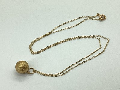 Lot 109 - A Novelty Basketball Charm Pendant, stamped...