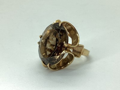 Lot 66 - A 9ct Gold Large Single Stone Dress Ring, oval...