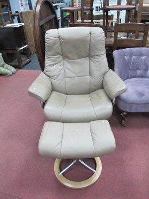 Lot 1584 - Beige Leather Stressless Reclining Armchair,...