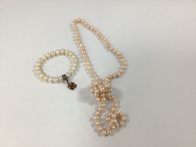 Lot 192 - A Single Strand Pearl Bead Necklace, together...