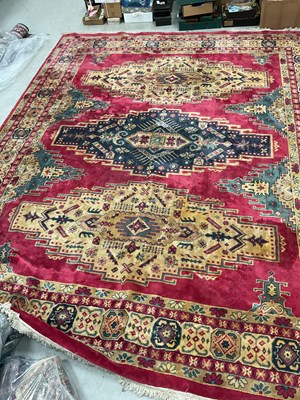Lot 1521 - Wool Tasselled Carpet, with three large...