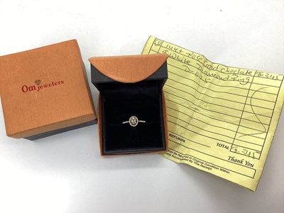 Lot 53 - A Modern Rose Gold Chocolate and White Diamond...