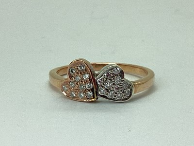 Lot 54 - A Modern Diamond Set Double Heart Ring, of...