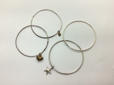 Lot 131 - Four Modern Bangles, stamped "925"...