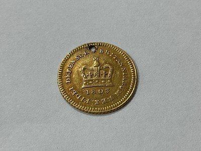 Lot 625 - 1803 George III Gold 1/3 Guinea, hole damage.