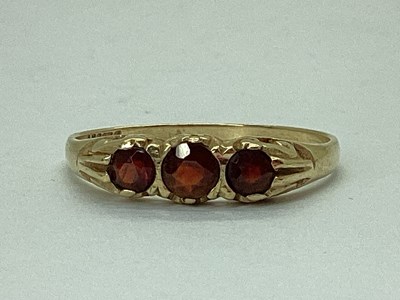 Lot 64 - A 9ct Gold Three Stone Dress Ring, of...
