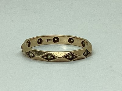 Lot 62 - A Full Eternity Style Ring, of geometric...