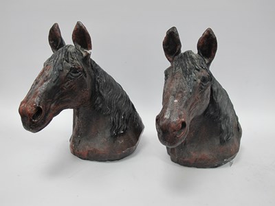 Lot 1454 - Two Concrete Horse Head Ornaments, (one...
