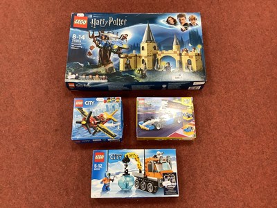 Lot 548 - Four boxed Lego sets, including #75953 Harry...