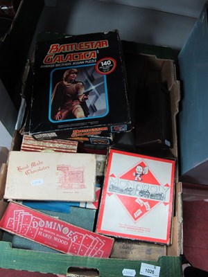Lot 1026 - Vintage jigsaws and board games, including...