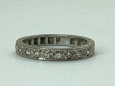 Lot 67 - An Ornate Patterned Half Eternity Style Ring,...