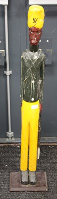 Lot 1333 - Carved and Painted Wooden Slender Figure of a...