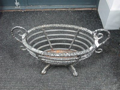 Lot 1157 - Cast Iron Fireplace Basket of oval form,...