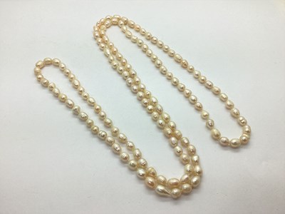 Lot 128 - A Single Strand Opera Length Freshwater Pearl...