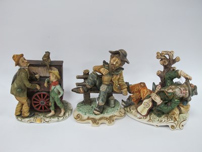 Lot 1209 - Capodimonte Figurine of a Tramp with a Guitar,...