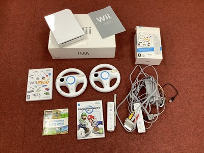 Lot 516 - A Nintendo Wii Games Console, boxed with other...