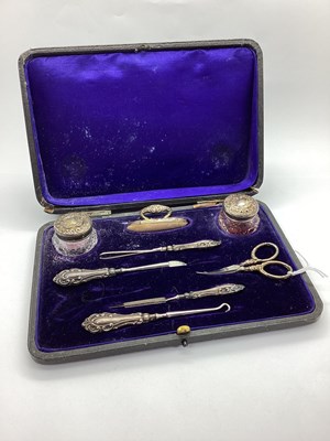 Lot 17 - An Edwardian Hallmarked Silver Mounted Part...