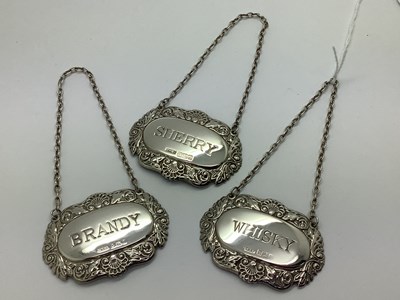 Lot 47 - A Set of Three Hallmarked Silver Decanter...