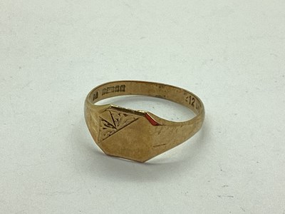 Lot 68 - A 9ct Gold Signet Ring, the shaped panel part...