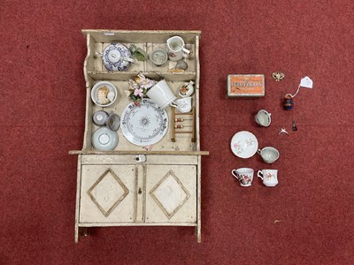 Lot 894 - A Wooden Dolls Dresser Unit, measuring...