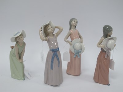 Lot 1254 - Lladro Figurines of Ladies with large hats,...