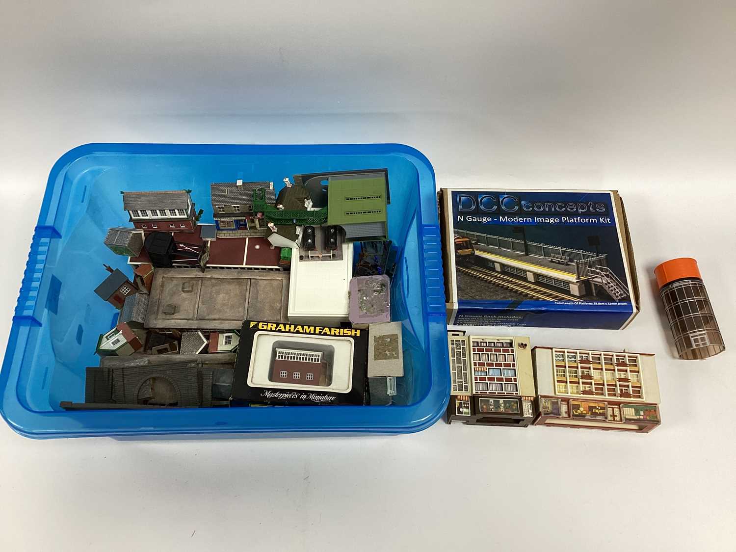Lot 318 - A quantity of N gauge buildings in resin,...