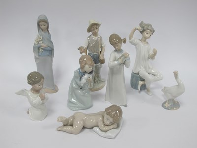 Lot 1237 - Lladro Figurines of Fisher Boy, 21cm tall,...