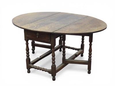 Lot 1585 - A Late XVII Century Joined Oak Drop Leaf Table,...