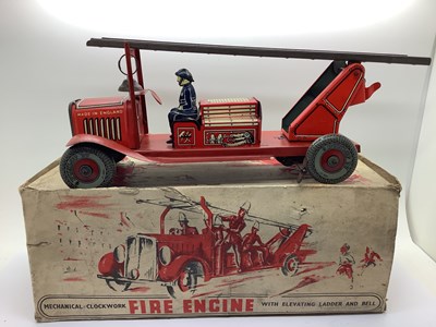 Lot 668 - A Mid XX Century Clockwork Tinplate Fire...