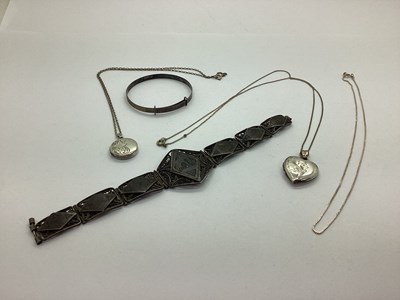 Lot 133 - A Heart Shape Locket Pendant, stamped "Silver",...