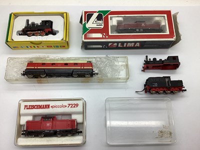 Lot 882 - Four boxed/cased N gauge German locomotives: a...