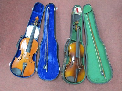Lot 1406 - Two vintage hard cased violins, reproduction...