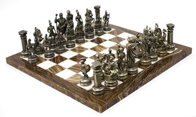 Lot 1387 - Marble board chess set with 32 Roman themed...