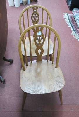Lot 1572 - Pair of vintage Ercol Windsor Fleur-de-Lys...