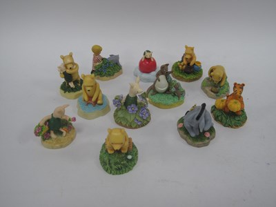 Lot 1428 - Twelve Disney Lenox “Winnie the Pooh” series...