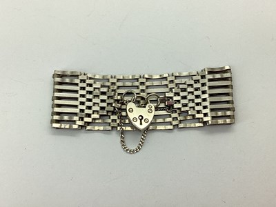 Lot 101 - A Wide Hallmarked Silver Gate Link Style...
