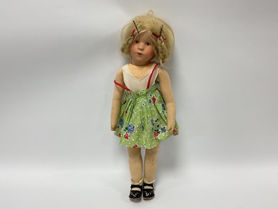 Lot 832 - A Kathe Kruse Doll, with painted hard plastic...