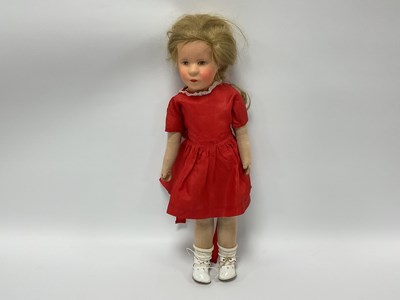 Lot 821 - A Kathe Kruse Doll, with painted hard plastic...